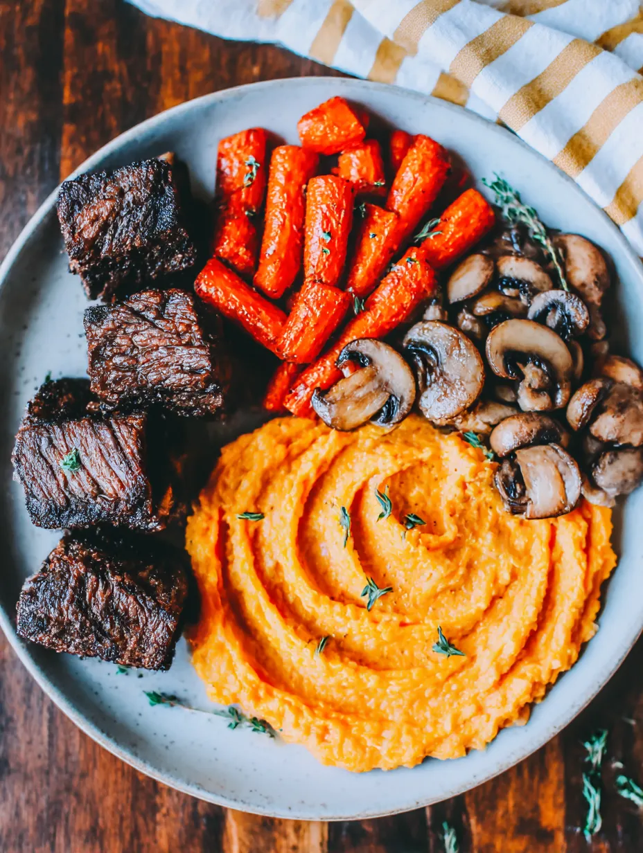 Meaty short ribs and veggies on a plate ready to eat.